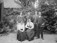 &copyTheCarterTribe.com 2013  Back Row: Frederick Tribe, Edward Tribe, Ernest Tribe, Arthur Tribe Front Row: Unknown (possibly Ada Mellor who married Frederick Tribe in 1914), Martha Tribe   Scanned from a full plate (6.5" x 4.5") glass negative