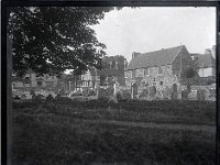 &copyTheCarterTribe.com 2013  View of Winchelsea Court Hall, now including Court Hall Museum, on the High Street, Winchelsea, from the graveyard of St Thomas the Martyr Church   Scanned from a 3.25" glass slide.